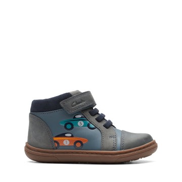 Side view of Baby boy's first high top boots. Demin Blue Leather  with car designs on the side, for his first steps. 